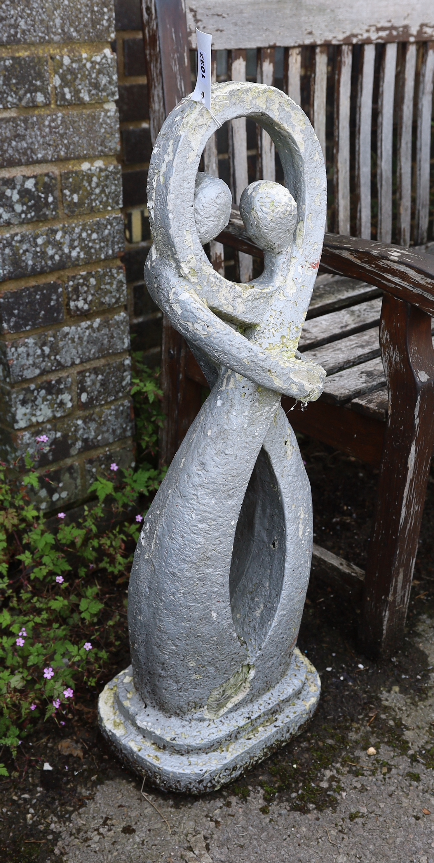 A painted reconstituted stone garden figural ornament, height 83cm